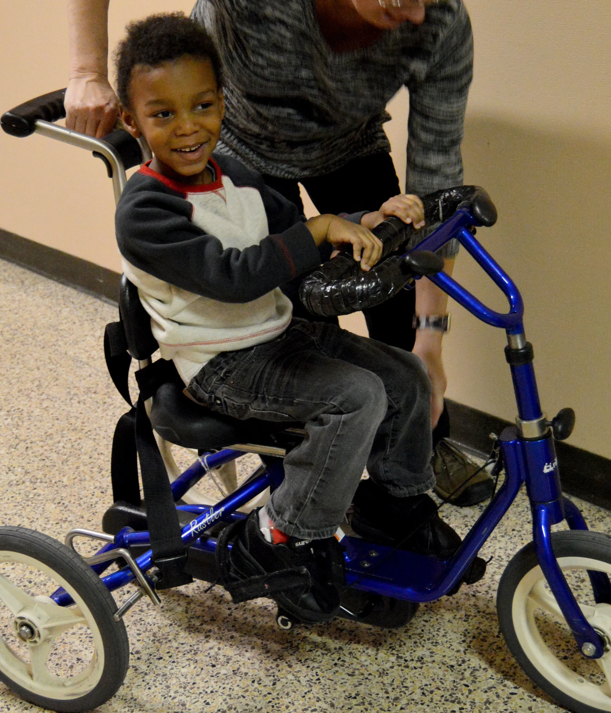 Tricycle for handicapped clearance child